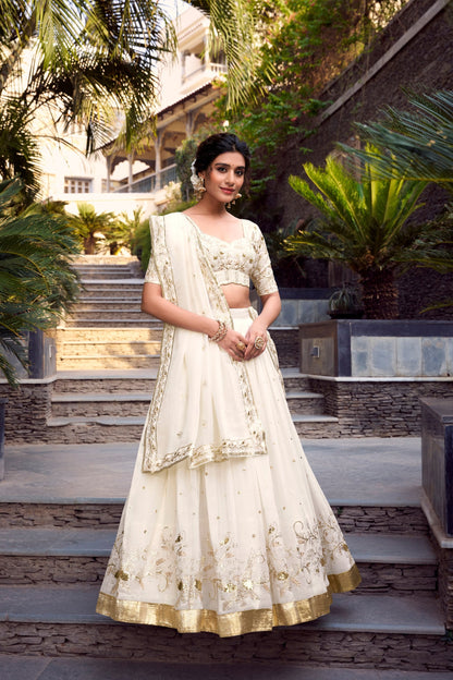 Wedding Wear Off White Color Sequins And Embroidery With Foil Work Designer Lehenga Choli