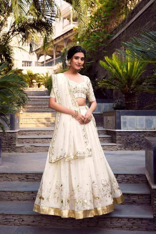 Wedding Wear Off White Color Sequins And Embroidery With Foil Work Designer Lehenga Choli