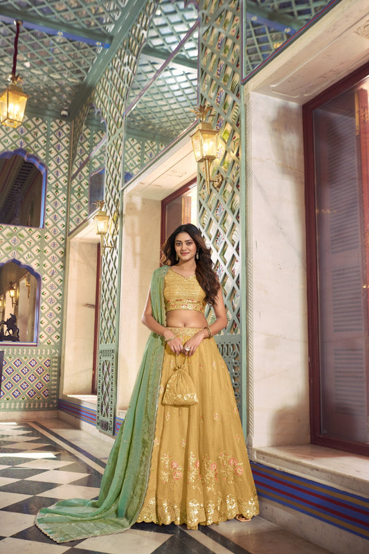 Traditional Wear Yellow Color Silk Thread Embroidered Lehenga Choli