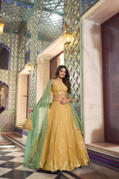 Traditional Wear Yellow Color Silk Thread Embroidered Lehenga Choli