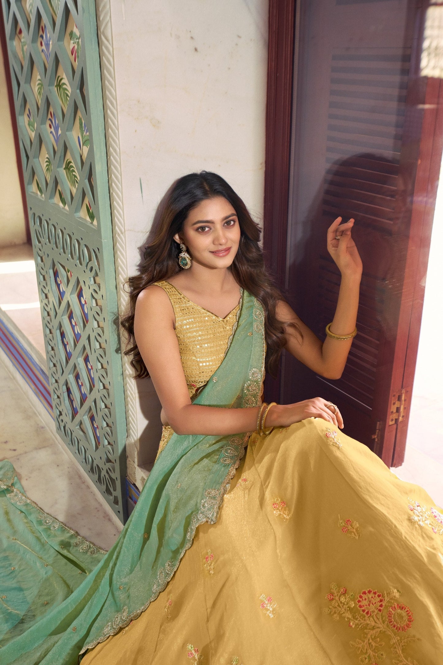 Traditional Wear Yellow Color Silk Thread Embroidered Lehenga Choli