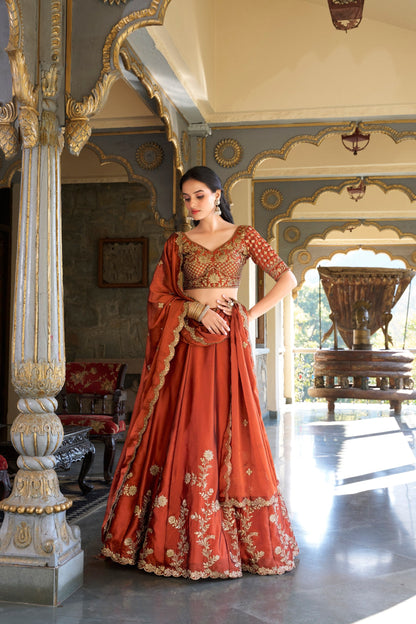 Party Wear Orange Color Rangoli Silk Sequins And Thread Embroidery Work Lehenga Choli