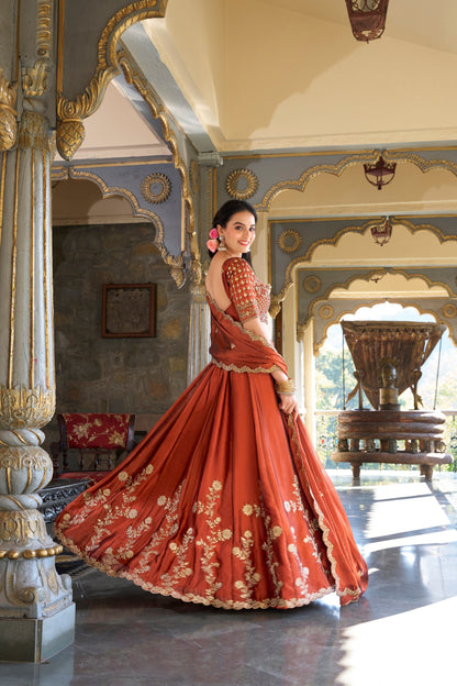 Party Wear Orange Color Rangoli Silk Sequins And Thread Embroidery Work Lehenga Choli