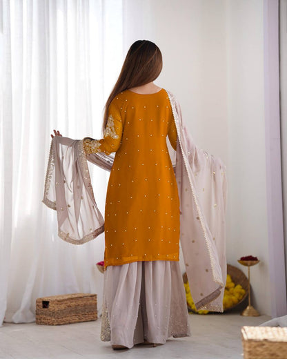 Traditional Wear Mustard Color Heavy Faux Georgette With Heavy Embroidery Work Palazzo Suit