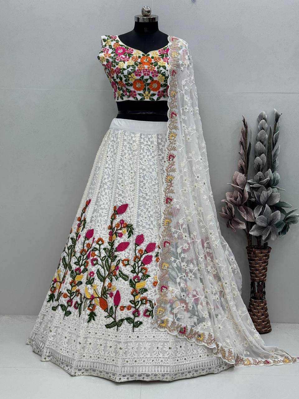 Delightful White Color Heavy Faux Georgette Chain Sequence Work Designer Lehenga Choli