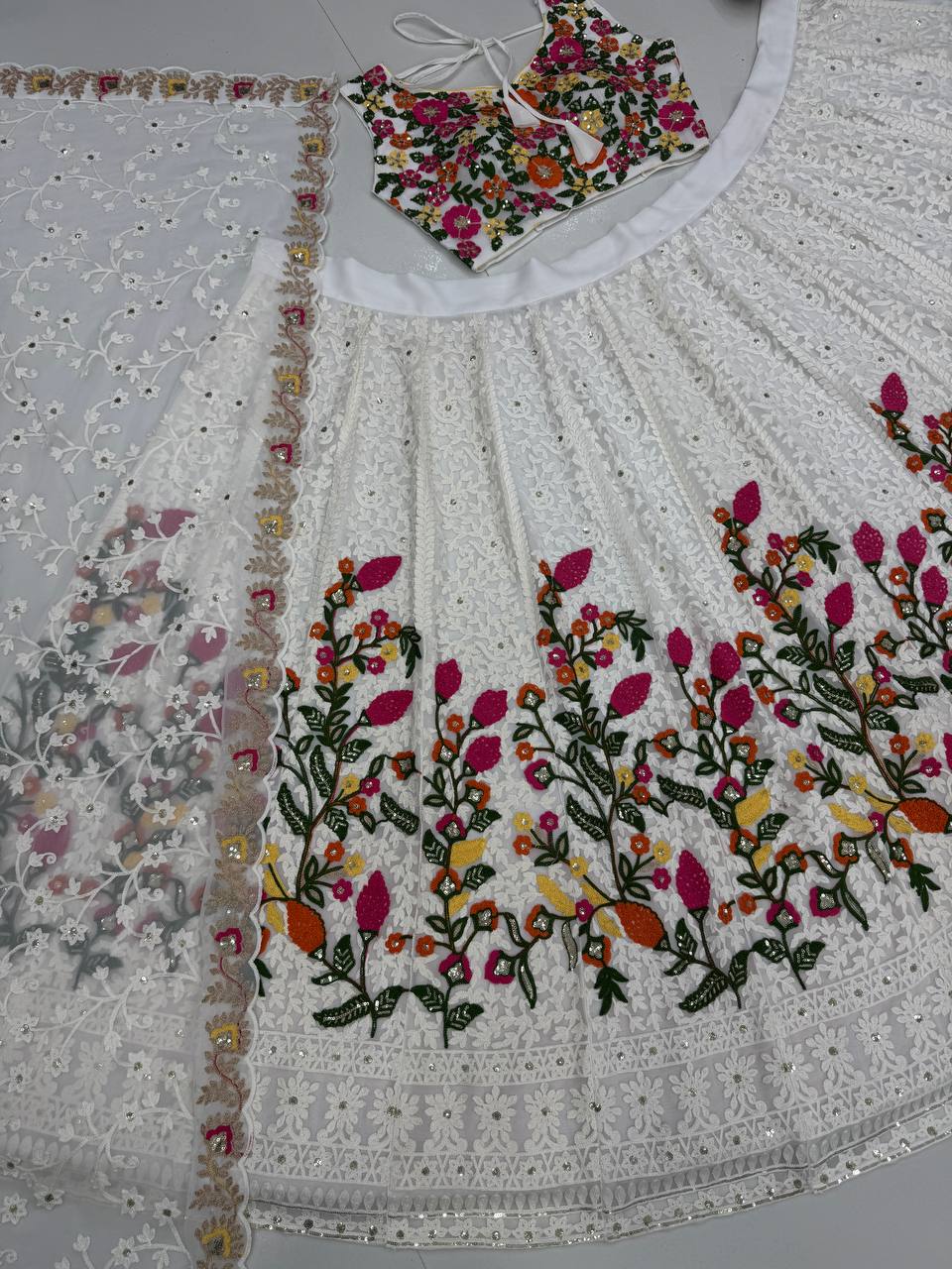 Delightful White Color Heavy Faux Georgette Chain Sequence Work Designer Lehenga Choli