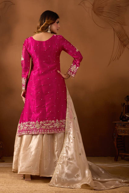 Festive Wear Pink Color Embroidered Top With Palazzo Suit