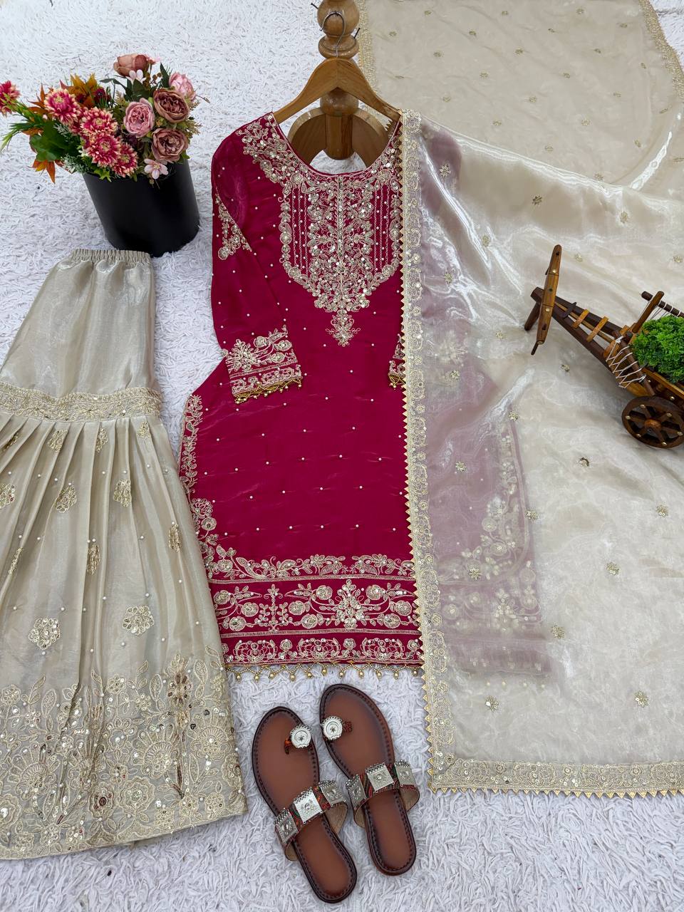 Festive Wear Pink Color Embroidered Top With Palazzo Suit