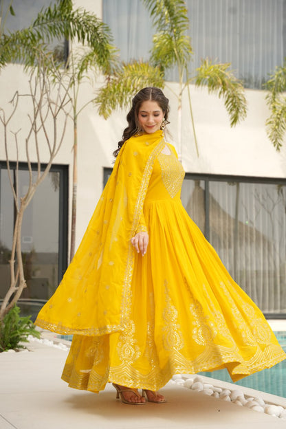Reception Wear Yellow Color Faux Blooming With Embroidery Zari Sequins Work Designer Gown
