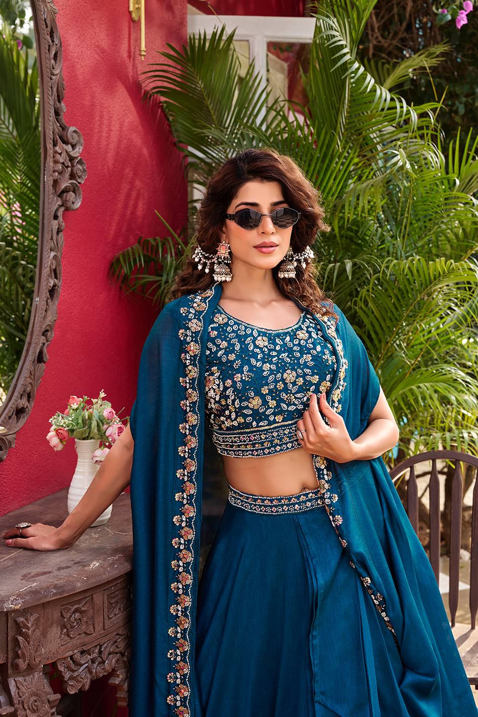 Ravishing Blue Color Embroidery With Moti Work Lehenga Choli