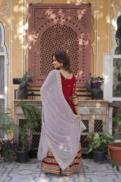 Outstanding Maroon Color Faux Blooming With Embroidery Zari Sequins Work Designer Gown