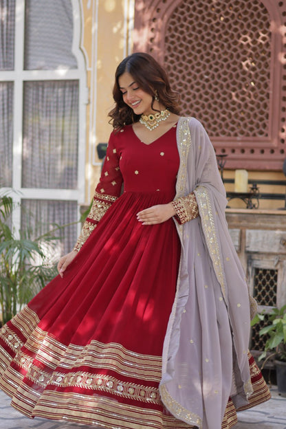 Outstanding Maroon Color Faux Blooming With Embroidery Zari Sequins Work Designer Gown