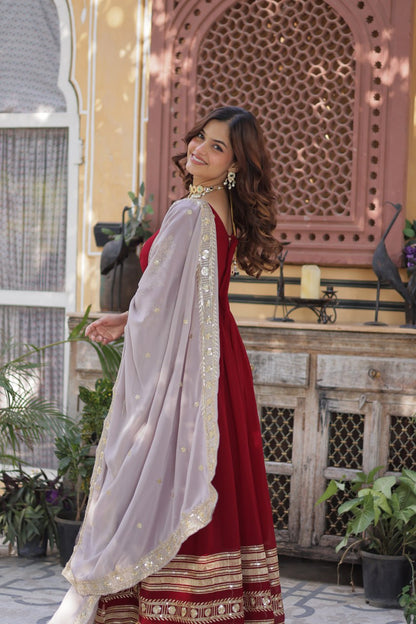 Outstanding Maroon Color Faux Blooming With Embroidery Zari Sequins Work Designer Gown