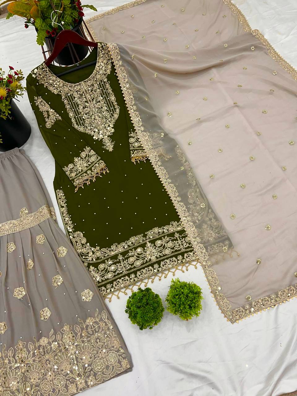 Traditional Wear Green Color Heavy Faux Georgette With Heavy Embroidery Work Palazzo Suit