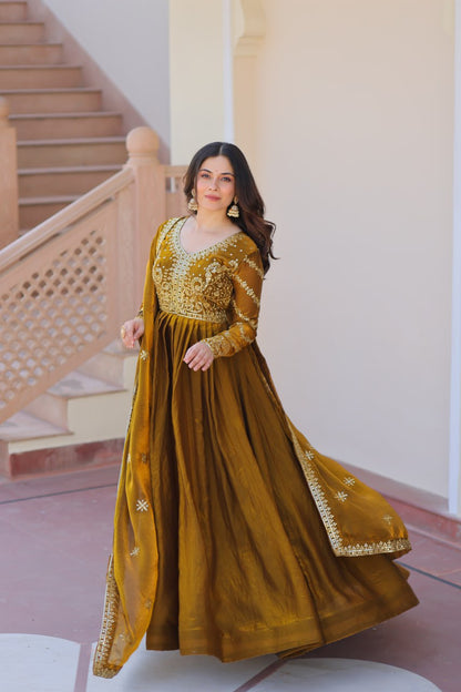 Occasion Wear Mahendi Color Zari And Sequins Embroidered Work Designer Gown
