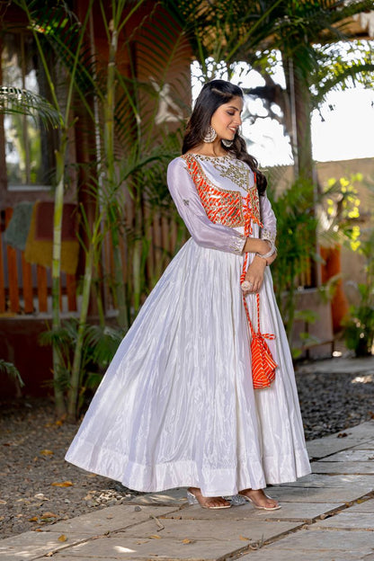 Traditional Wear Off White Color Pure Chinon With Laheriya Printed Beautiful Gown