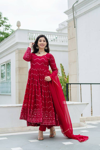 Luxuriant Maroon Color Faux Georgette Fabric With All Over Embroidery Work Anarkali Suit