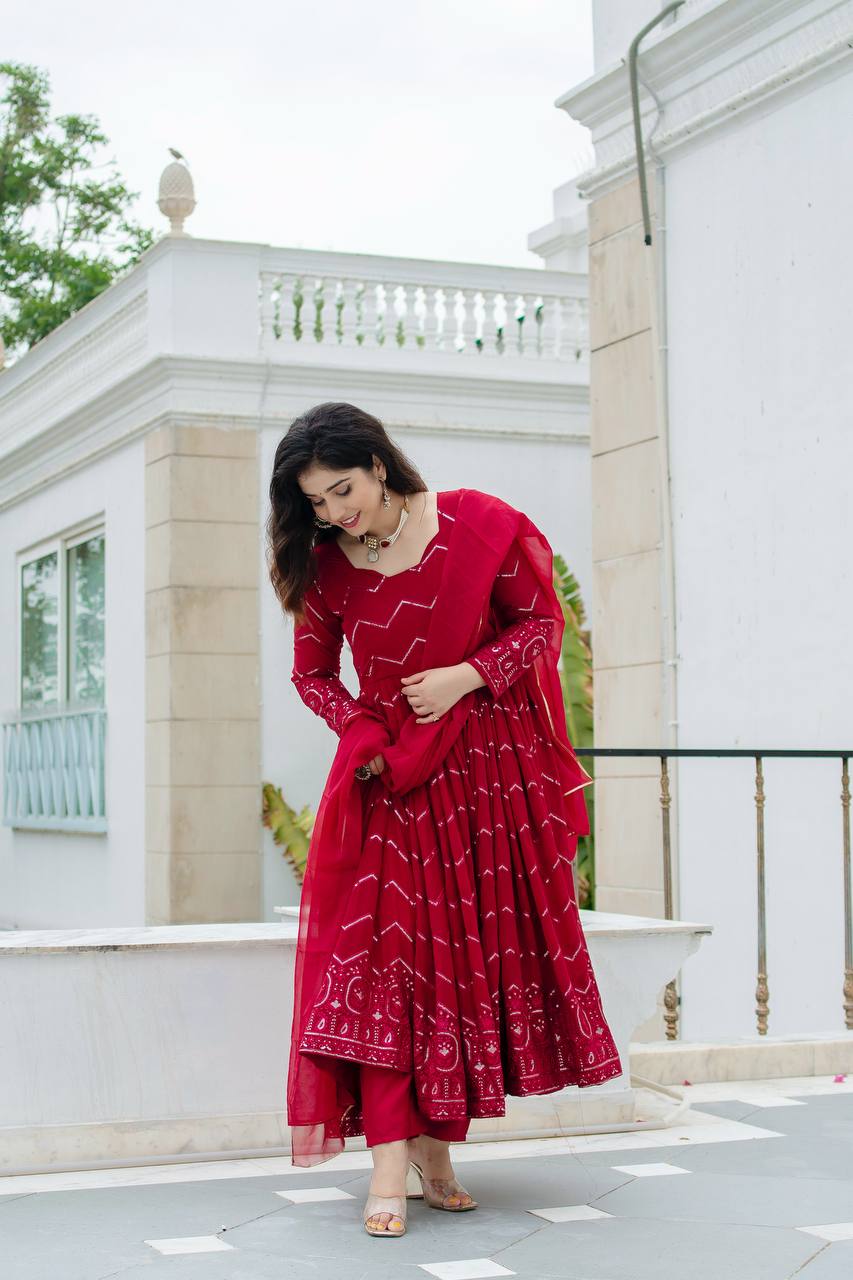 Luxuriant Maroon Color Faux Georgette Fabric With All Over Embroidery Work Anarkali Suit