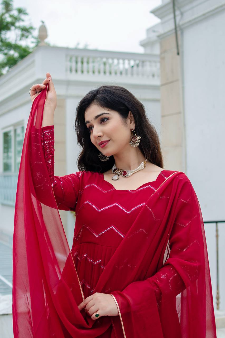 Luxuriant Maroon Color Faux Georgette Fabric With All Over Embroidery Work Anarkali Suit