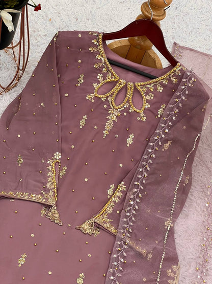 Exclusive Brown Color Heavy Faux Georgette With Heavy Embroidery Sequence Work