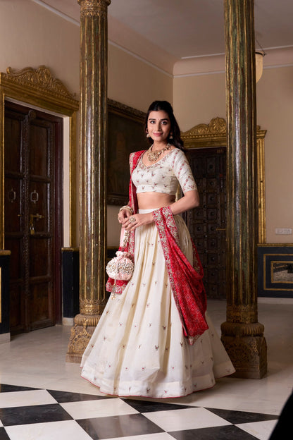 Bridal Wear Off White Color Vichitra Silk Sequins And Thread Embroidery Work Lehenga Choli