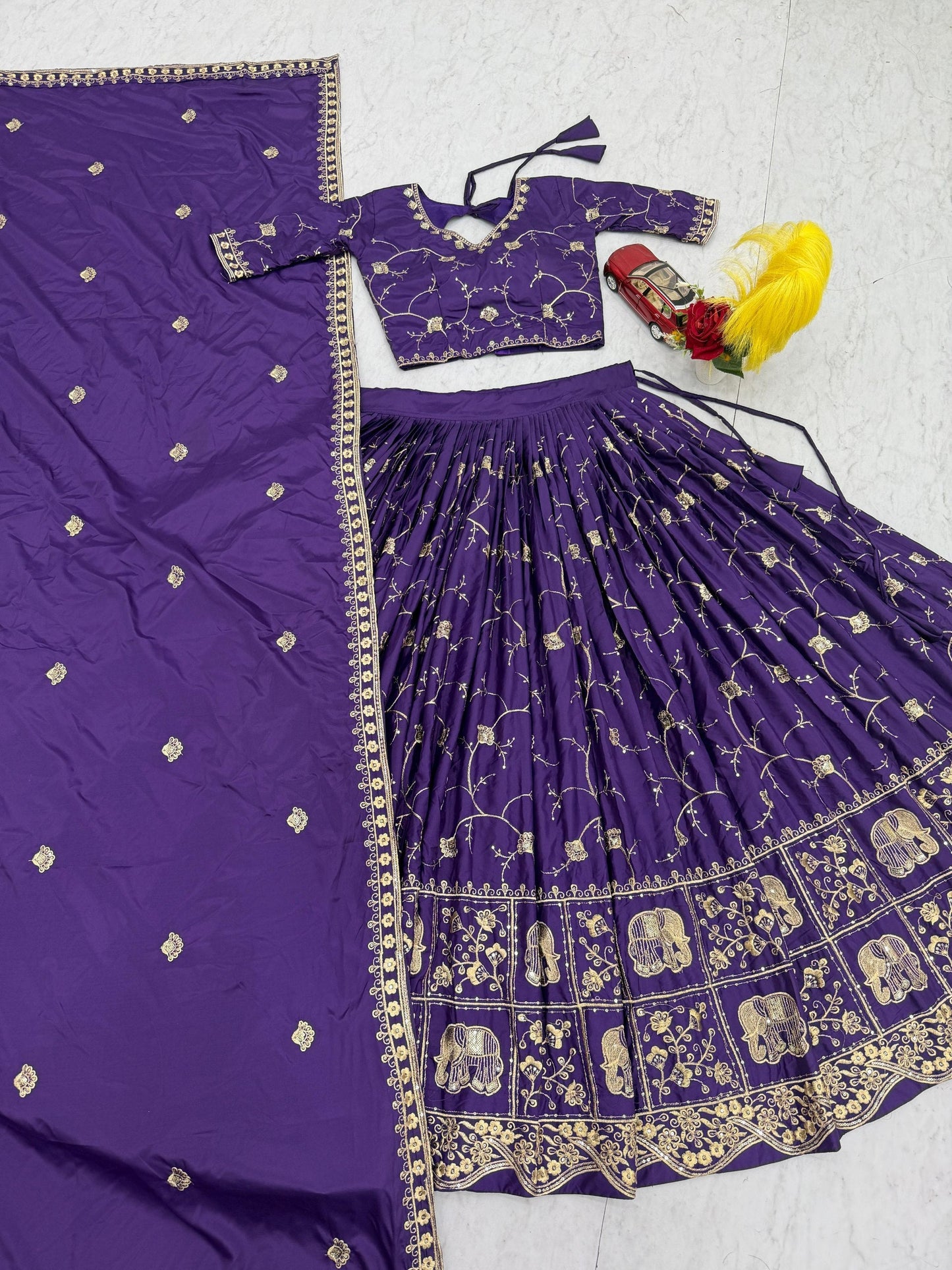 Celebrity Style Purple Color Heavy Embroidered Lehenga Set