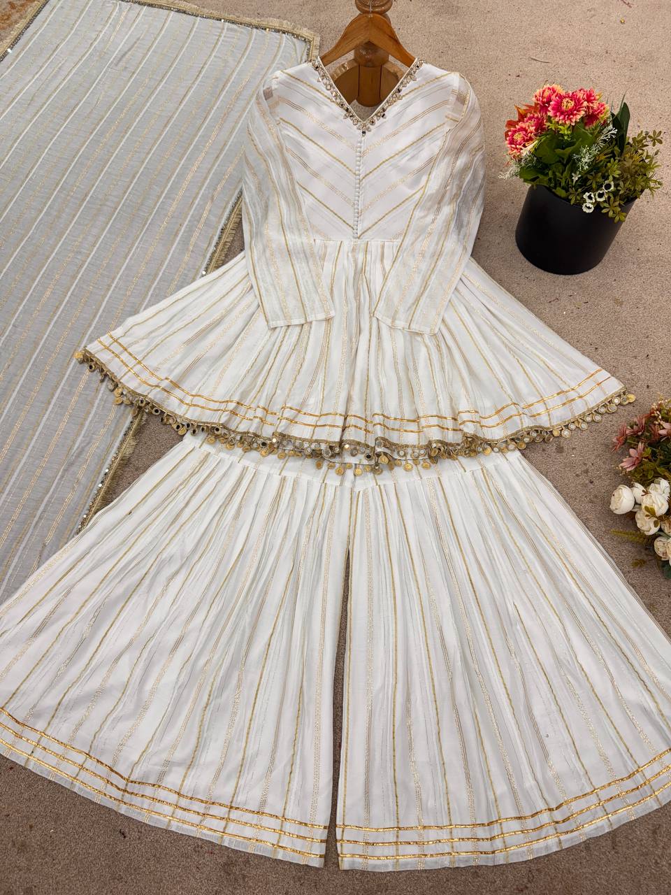 Arti Chauhan's Off White Color Mirror With Handwork Designer Sharara Suit