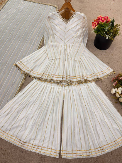 Arti Chauhan's Off White Color Mirror With Handwork Designer Sharara Suit