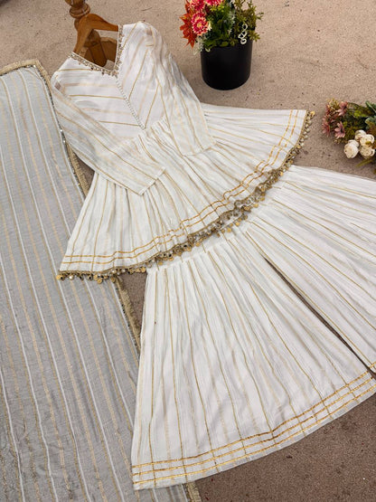 Arti Chauhan's Off White Color Mirror With Handwork Designer Sharara Suit