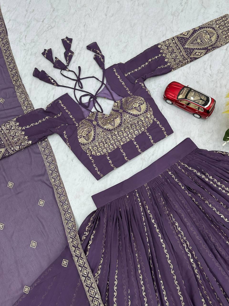 Wedding Wear Purple Color Heavy Faux Georgette With Embroidery sequence Work Lehenga Choli