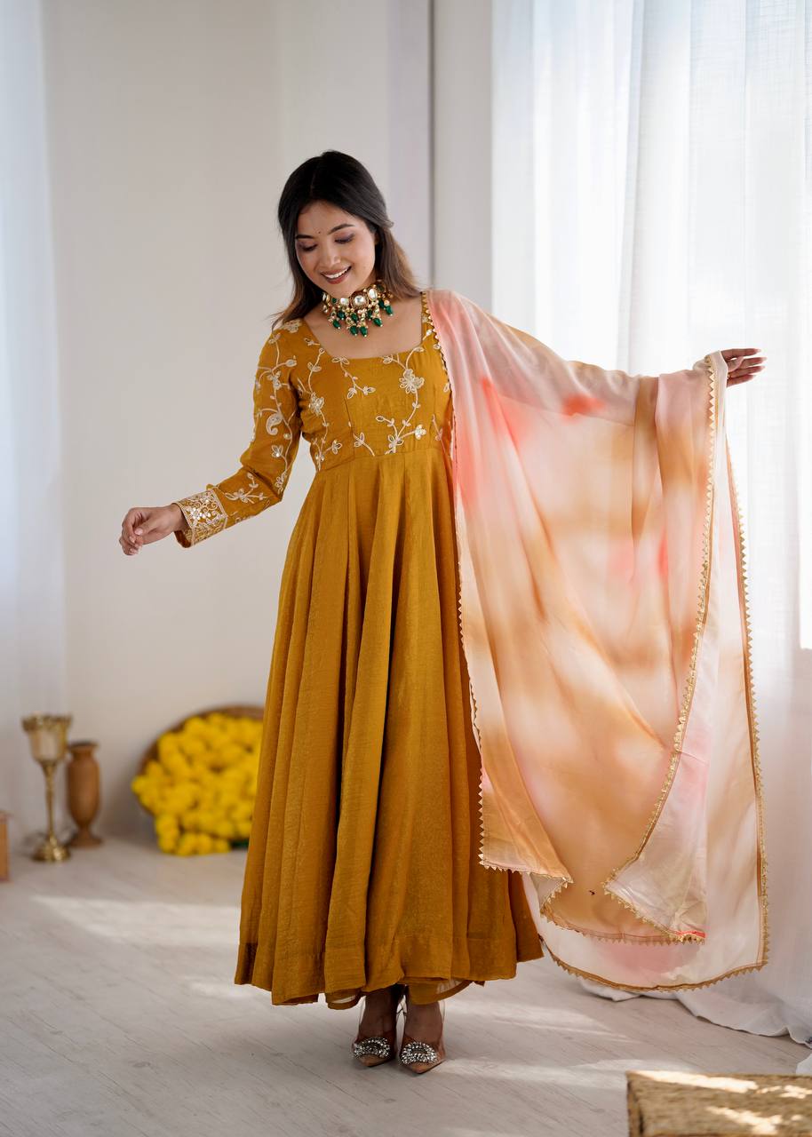 Haldi Wear Mustard Color Heavy Crunchy Silk Embroidered Gown