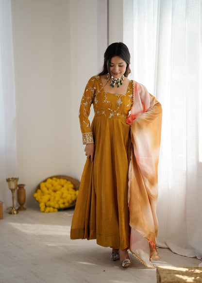 Haldi Wear Mustard Color Heavy Crunchy Silk Embroidered Gown