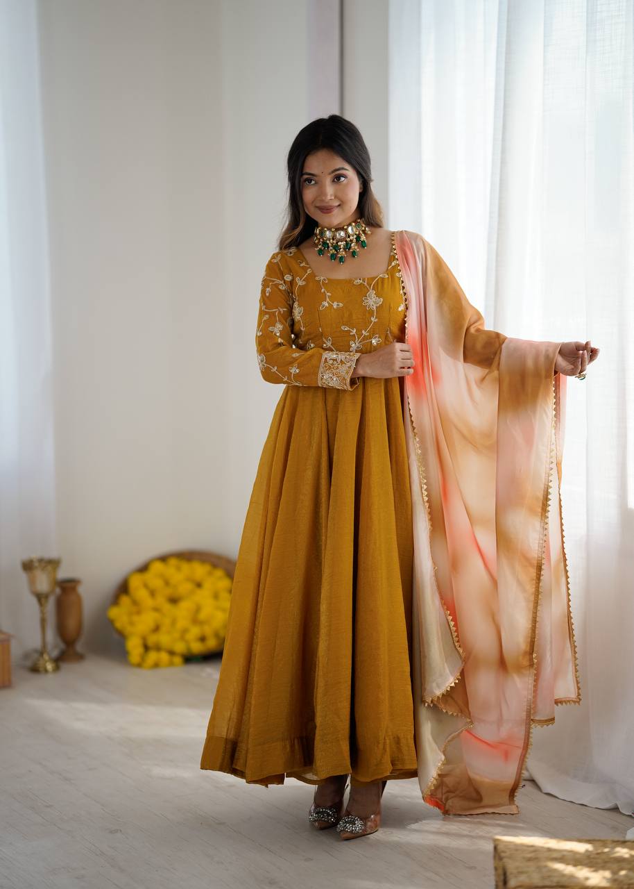 Haldi Wear Mustard Color Heavy Crunchy Silk Embroidered Gown