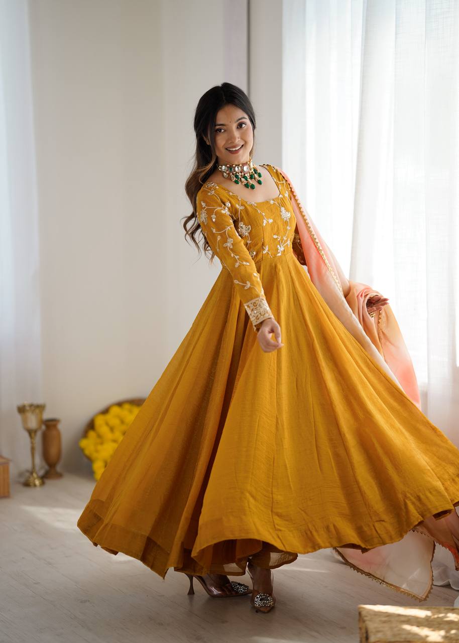 Haldi Wear Mustard Color Heavy Crunchy Silk Embroidered Gown