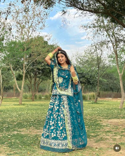 Party Wear Teal Blue Faux Georgette With Heavy Embroidery Coding Sequence Work Lehenga Choli