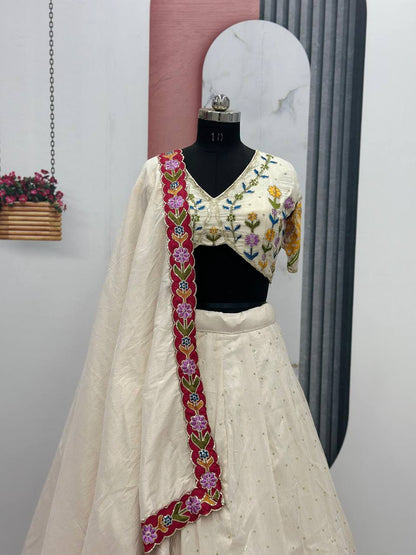 Ceremony Wear Cream Color Tissue Simmer Silk And Embroidery Sequence Work Lehenga Choli