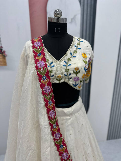 Ceremony Wear Cream Color Tissue Simmer Silk And Embroidery Sequence Work Lehenga Choli
