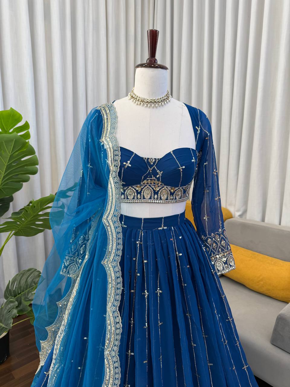 Engagement Wear Navy Color Embroidered Lehenga Choli With Butterfly Net Dupatta