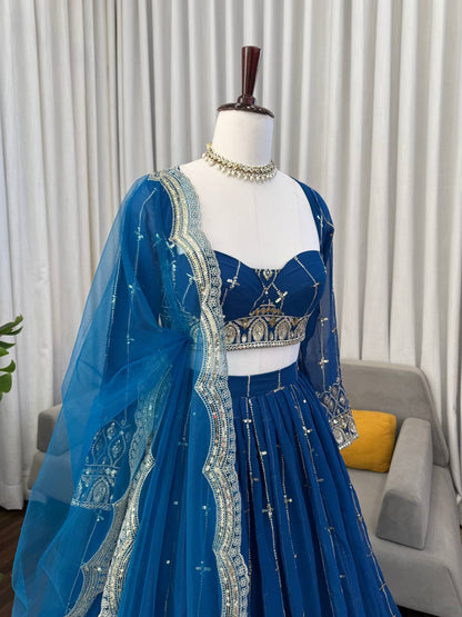 Engagement Wear Navy Color Embroidered Lehenga Choli With Butterfly Net Dupatta