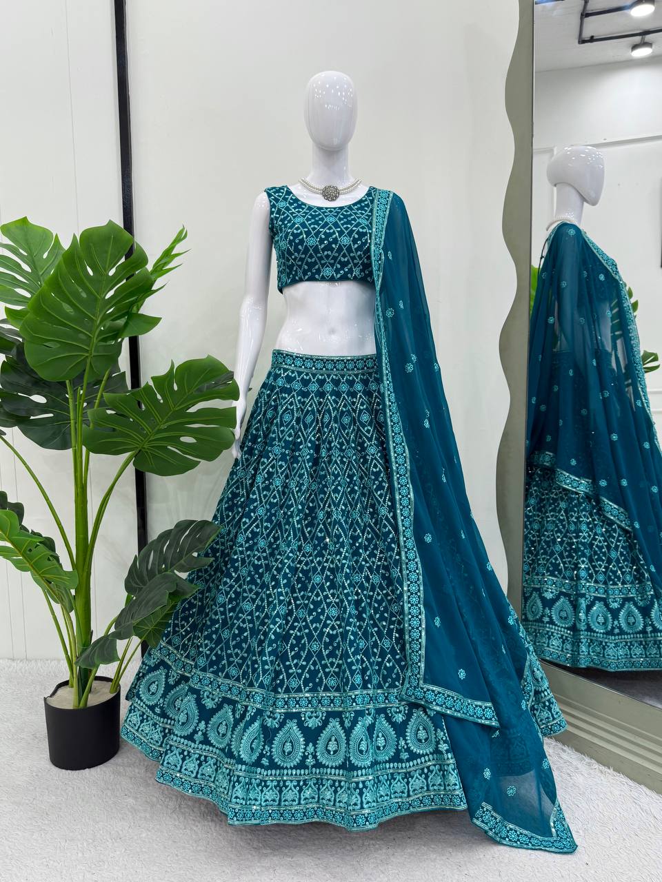 Designer Aqua Blue Color Embroidered Receptions Lehenga Choli Set