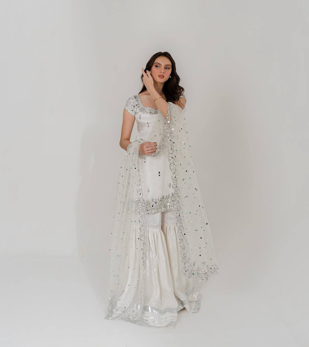 Designer White Color Embroidered Top With Sharara And Mirror Work Dupatta Set