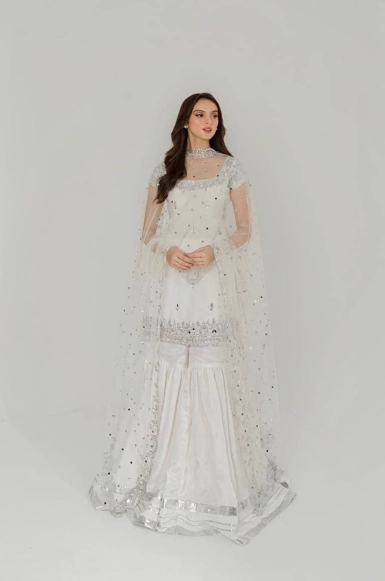 Designer White Color Embroidered Top With Sharara And Mirror Work Dupatta Set