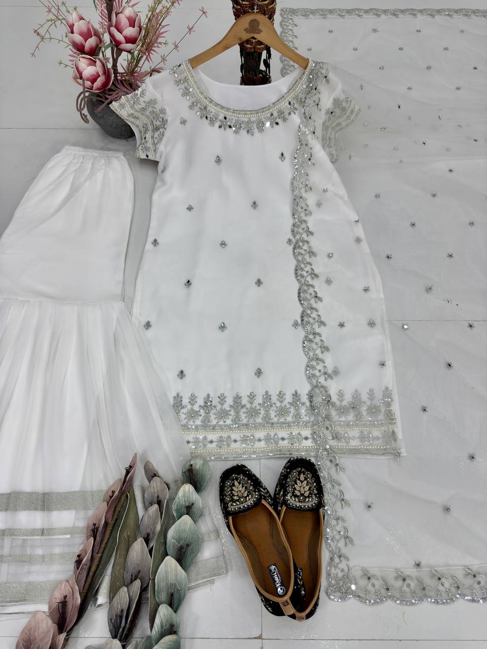 Designer White Color Embroidered Top With Sharara And Mirror Work Dupatta Set