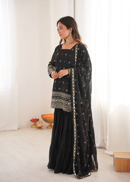 Arti Chauhan Black Color Georgette Top With Ruffle Sharara And Dupatta Set