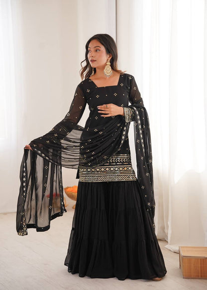 Arti Chauhan Black Color Georgette Top With Ruffle Sharara And Dupatta Set