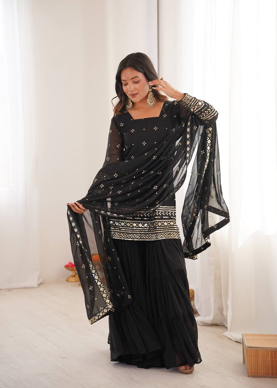 Arti Chauhan Black Color Georgette Top With Ruffle Sharara And Dupatta Set