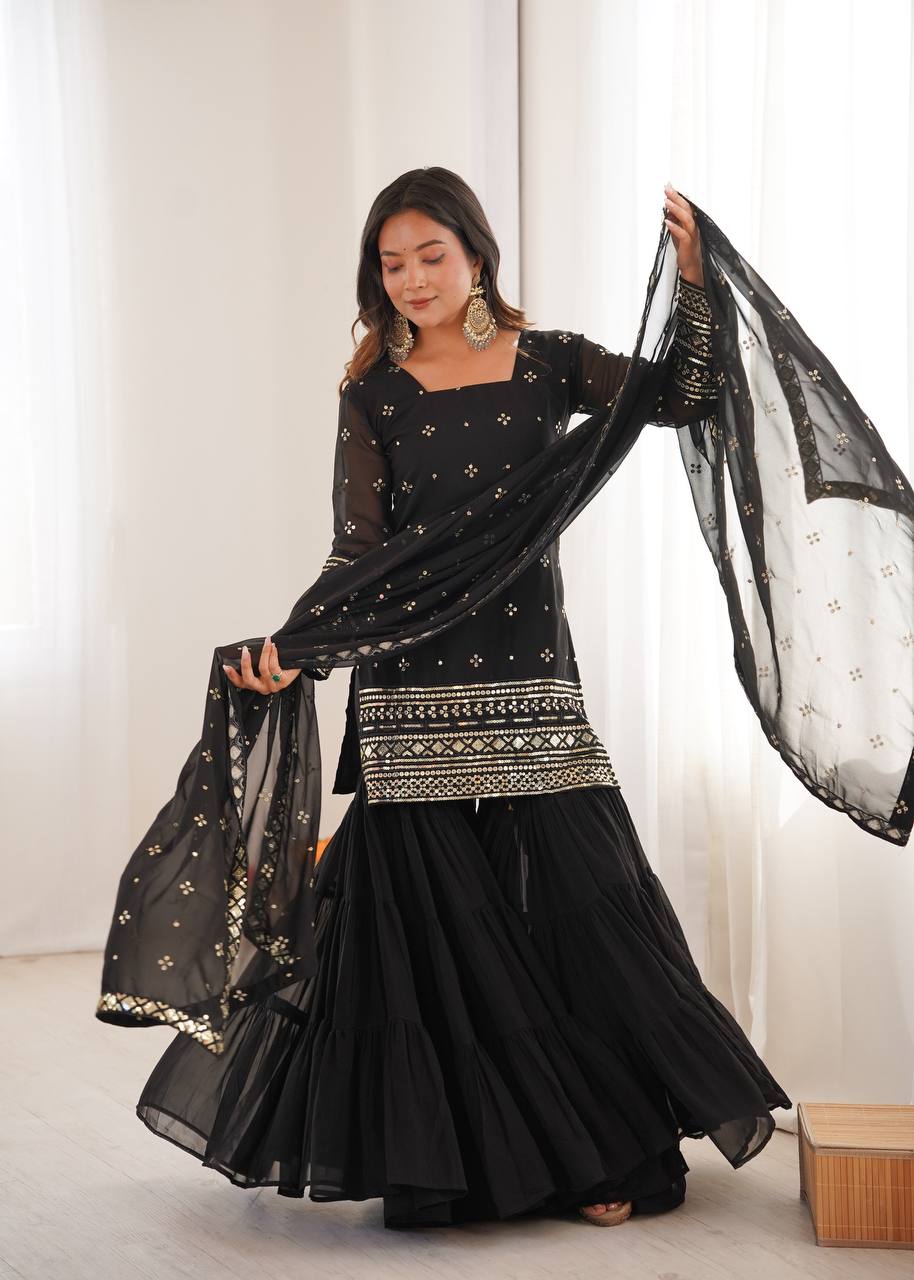 Arti Chauhan Black Color Georgette Top With Ruffle Sharara And Dupatta Set