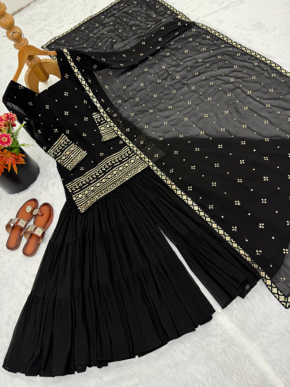 Arti Chauhan Black Color Georgette Top With Ruffle Sharara And Dupatta Set