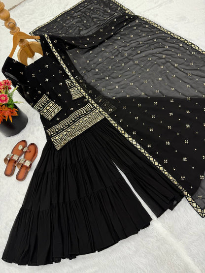 Arti Chauhan Black Color Georgette Top With Ruffle Sharara And Dupatta Set