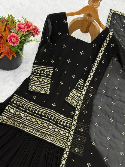Arti Chauhan Black Color Georgette Top With Ruffle Sharara And Dupatta Set